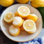 Lemon blossoms in full bloom, showcasing their delicate yellow petals and vibrant fragrance.