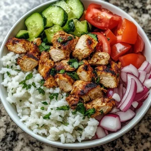 Delicious Chicken Gyro Bowls served with fresh vegetables and tzatziki sauce.