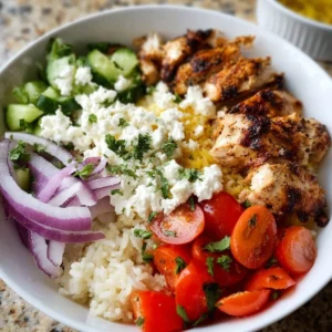Delicious and nutritious Greek chicken bowls with fresh vegetables and spices