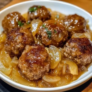 Delicious French Onion Meatballs served with melted cheese and caramelized onions