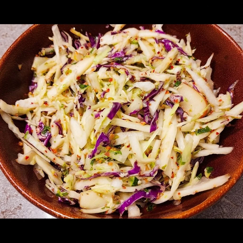 Quick Cabbage Apple Slaw with fresh ingredients in a bowl.