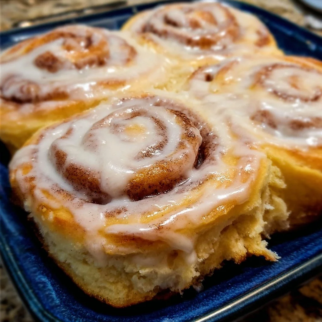 Delicious homemade Cinnabon cinnamon rolls freshly baked and glazed.