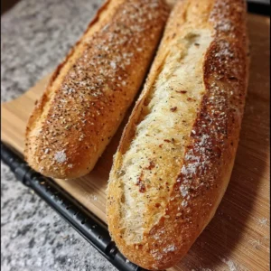 Fresh gluten-free grain baguette without yeast, golden crust and soft interior.