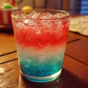 Colorful non-alcoholic layered drinks in a glass
