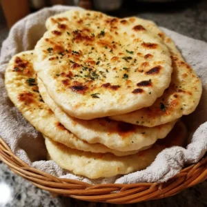 Freshly baked pita bread served with dips and fillings