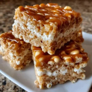 Delicious brown butter dulce de leche rice krispie treats on a plate