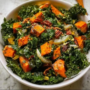 Easy roasted sweet potato kale salad topped with fresh ingredients