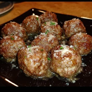 Delicious baked meatballs fresh out of the oven, ready to serve.