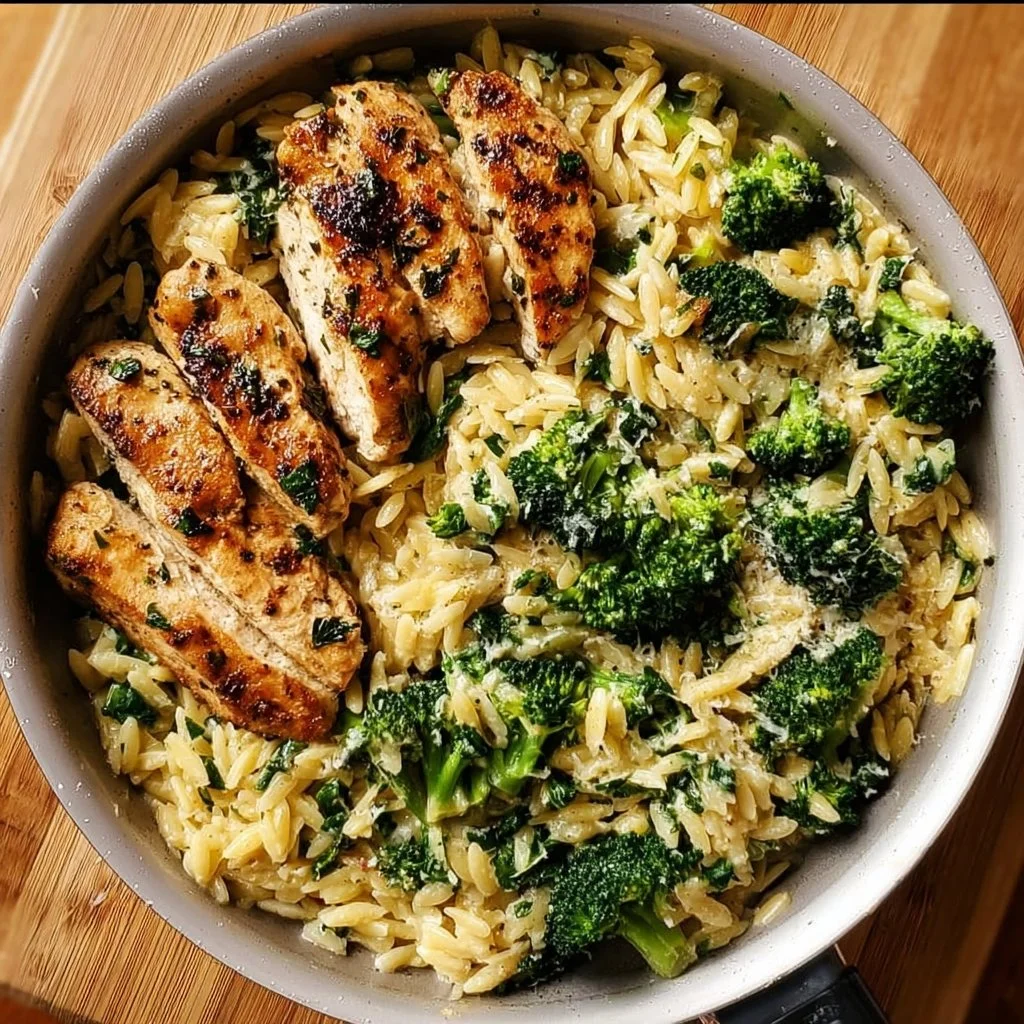 Garlic Parmesan Chicken and Broccoli Orzo Skillet in a skillet