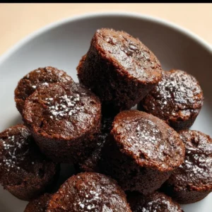 Delicious mini brownie bites ready to be enjoyed as a sweet treat.
