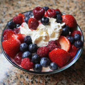 Delicious Berry Cheesecake Salad with fresh fruits and creamy cheesecake dressing