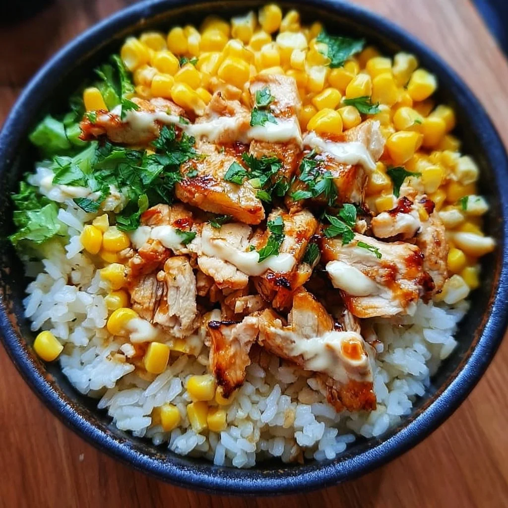 Street corn chicken rice bowl topped with fresh ingredients and vibrant flavors