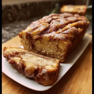 Freshly baked Apple Cinnamon Swirl Bread with cinnamon and apple filling