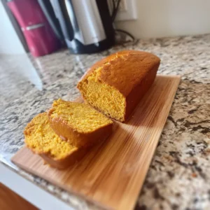 Loaf of delicious homemade pumpkin bread with spices and nuts