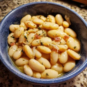 Creamy Southern butter beans dish served with fresh herbs