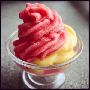 Creamy Strawberry Dole Whip served in a bowl, perfect summer dessert.