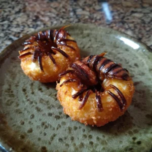 Halloween crispy fried cockroach donut decorated for spooky celebrations