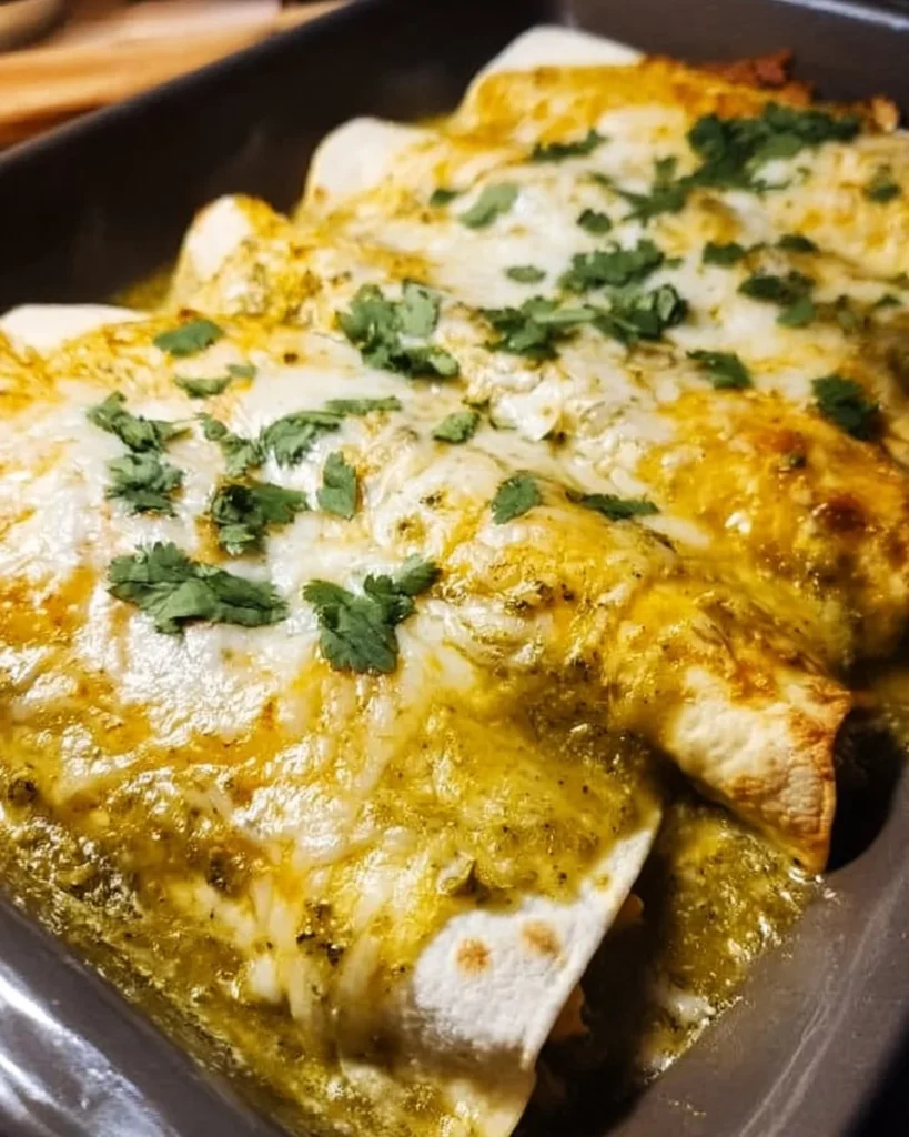 Delicious green chicken enchiladas topped with homemade salsa verde sauce