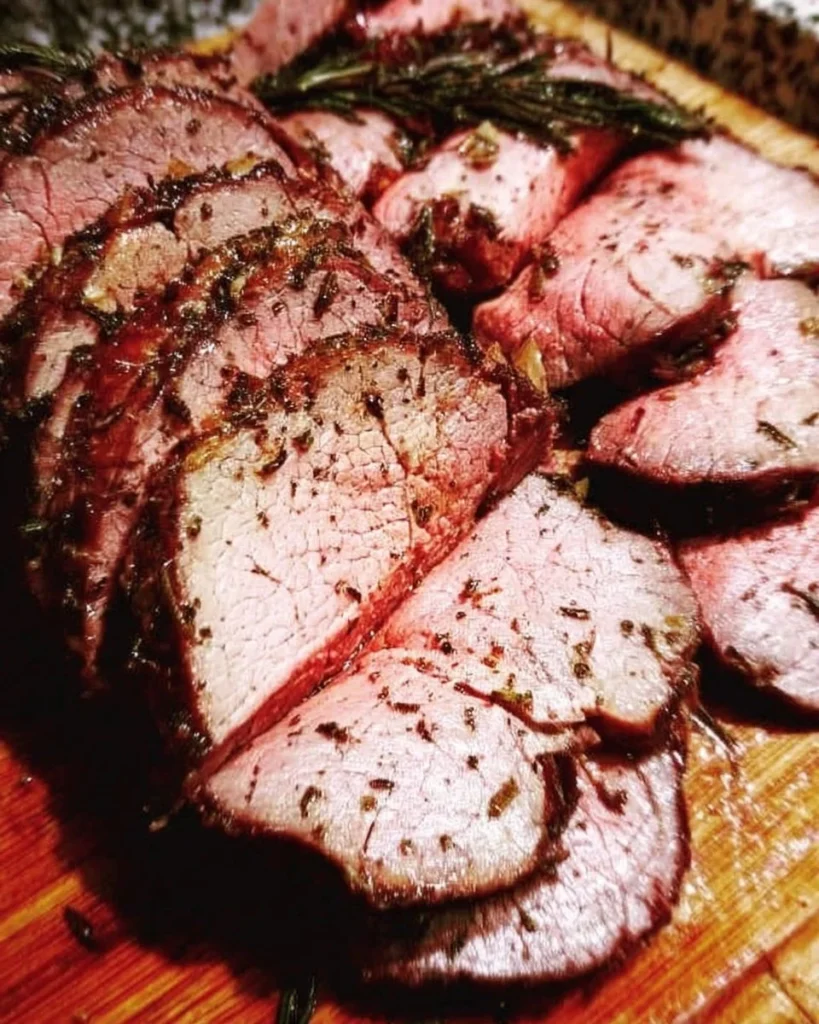 Juicy and tender roast beef tenderloin sliced for serving