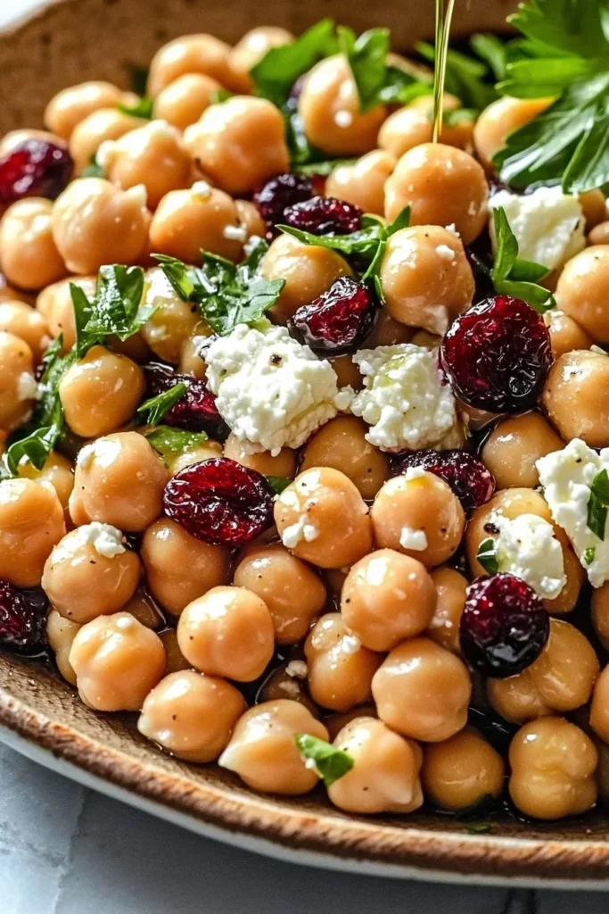 Delicious feta and cranberry chickpeas in a bowl, a healthy snack option.