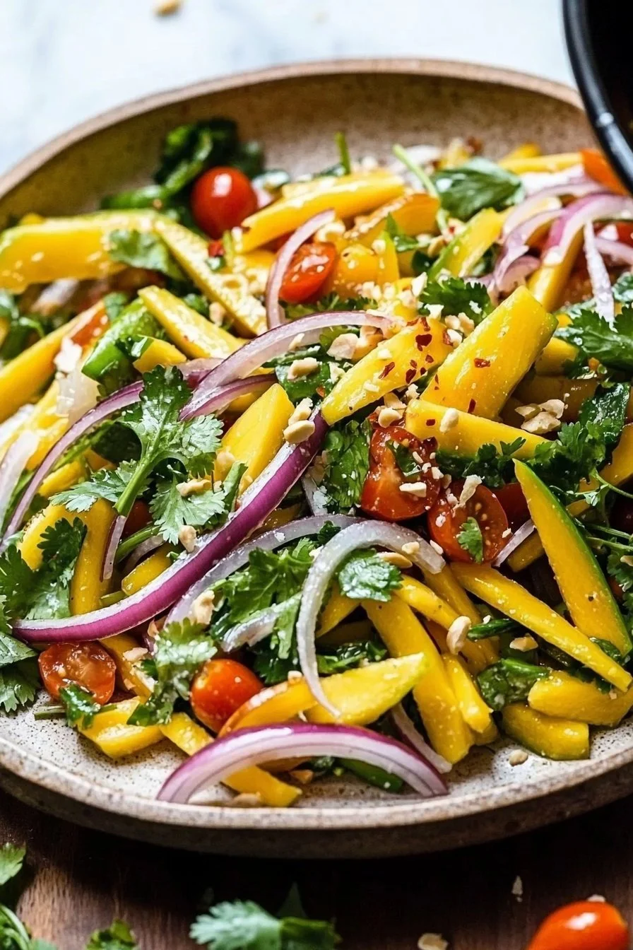 Fresh Green Thai Mango Salad with vibrant vegetables and mango slices
