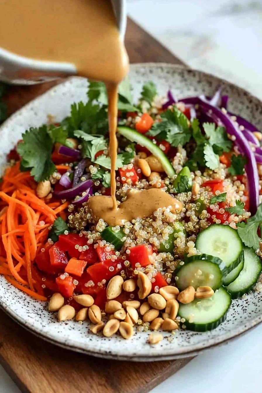 Vegan Thai Quinoa Salad with fresh vegetables and herbs in a bowl