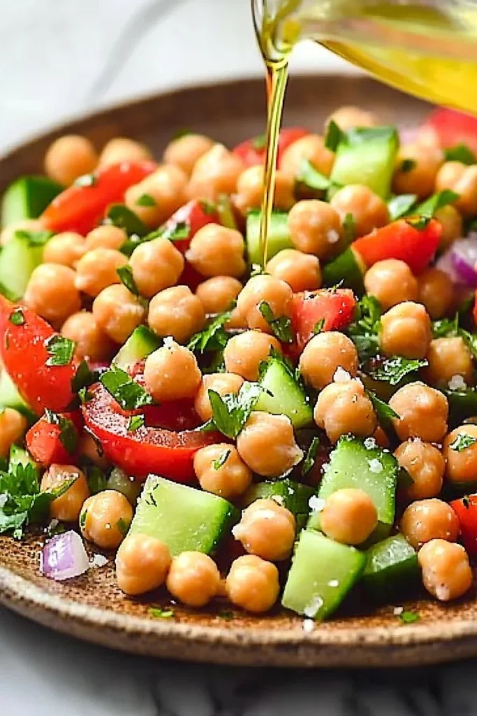 Fresh and vibrant chickpea salad with vegetables and dressing