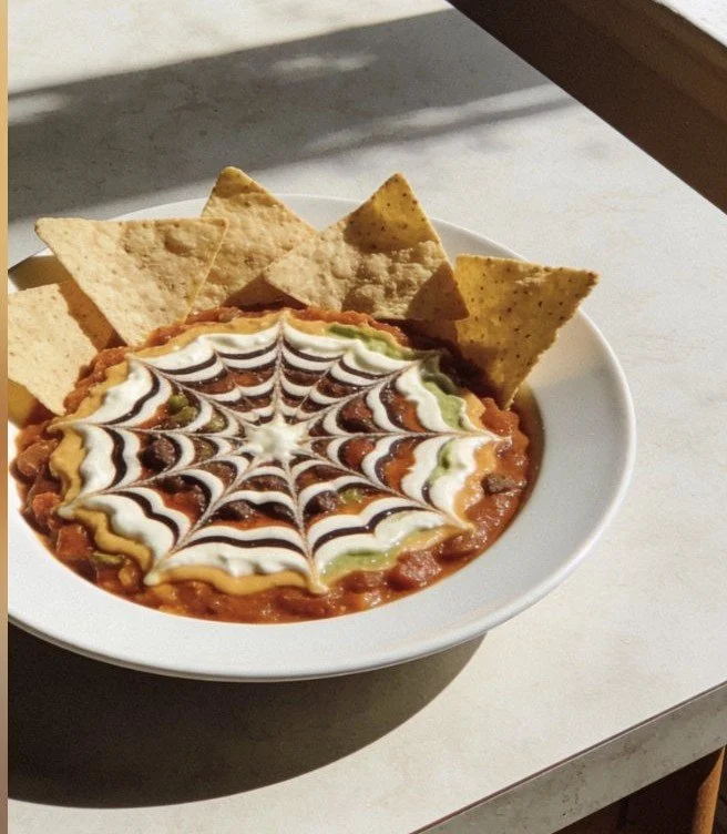 Delicious Halloween Spider Web Dip served in a festive bowl.